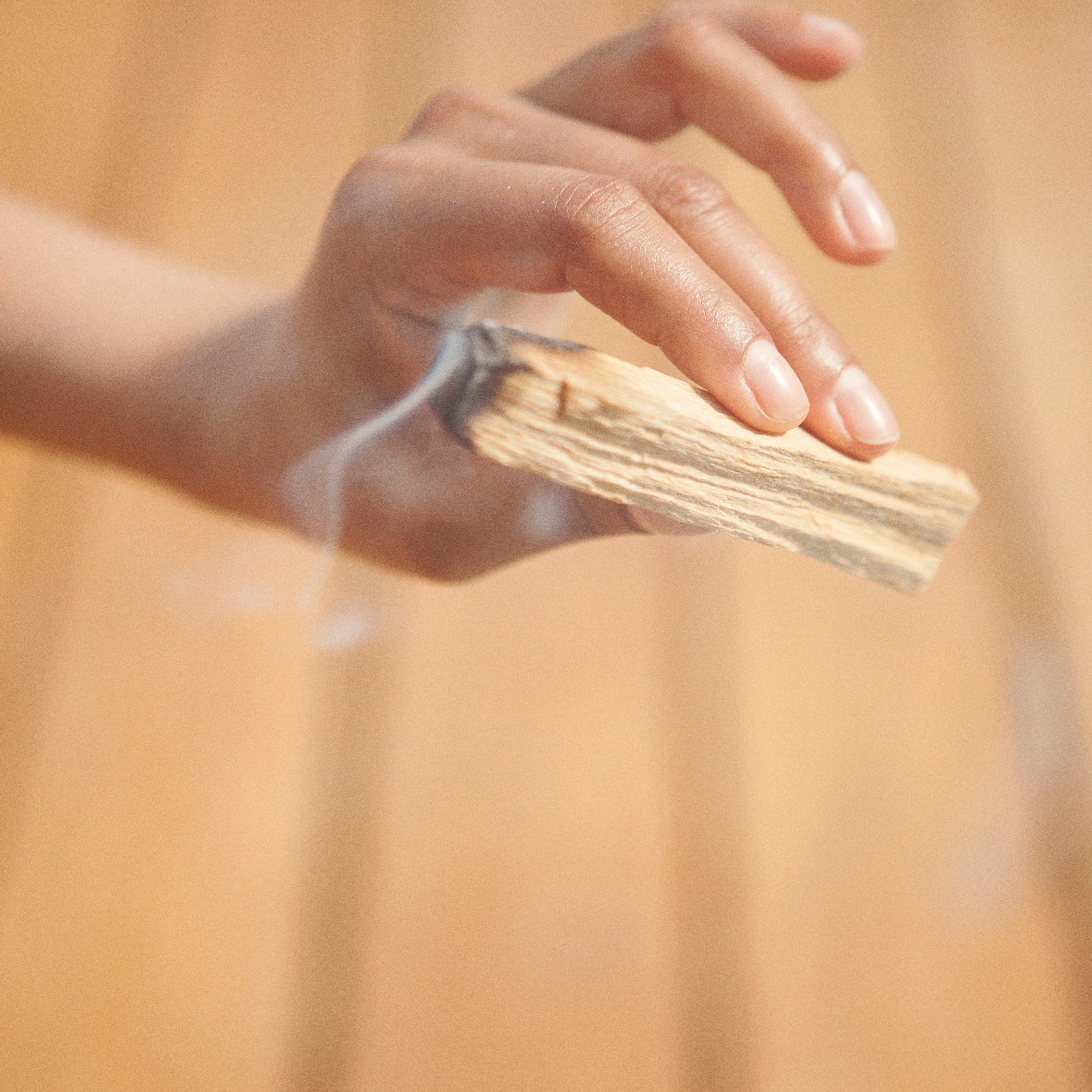 smoke coming from a very thick palo santo piece (a beautiful wood - this one is from Peru)