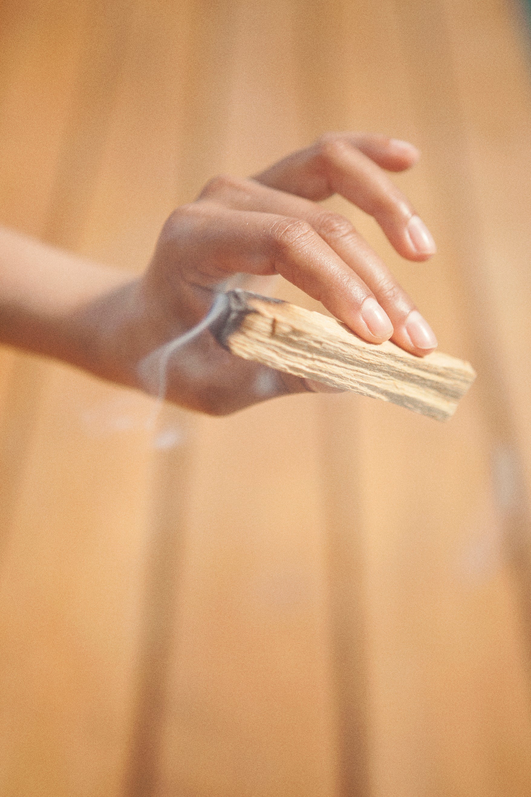 smoke coming from a very thick palo santo piece (a beautiful wood - this one is from Peru)